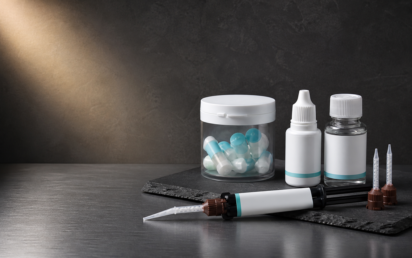 Dental cement capsules, clinical bottles and an automix resin cement syringe